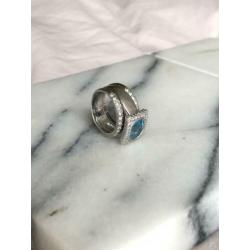 14kr wit gouden ring met topaas en diamanten 17mm/ringmt 53