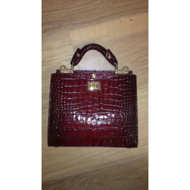 Donker rode leren nieuwe tas