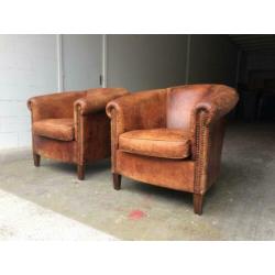 2 schapenleren clubfauteuils vintage