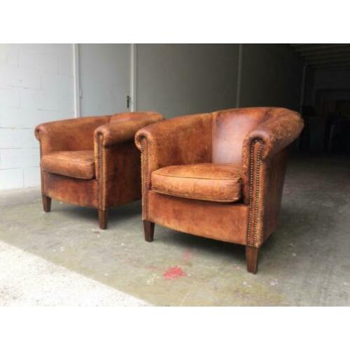 2 schapenleren clubfauteuils vintage