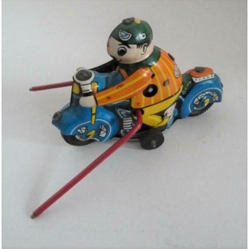 Blikken motor met clown 663 Made in Shanghai China >>Huki