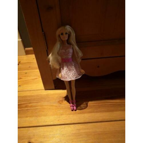 Barbie met opname functie, die weer afgespeeld kan worden