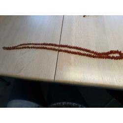 Lange barnstenen ketting