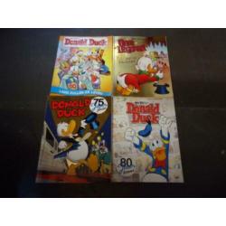 Veel Donald Duck strips/albums en boeken, enkele in seal.