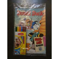 Veel Donald Duck strips/albums en boeken, enkele in seal.