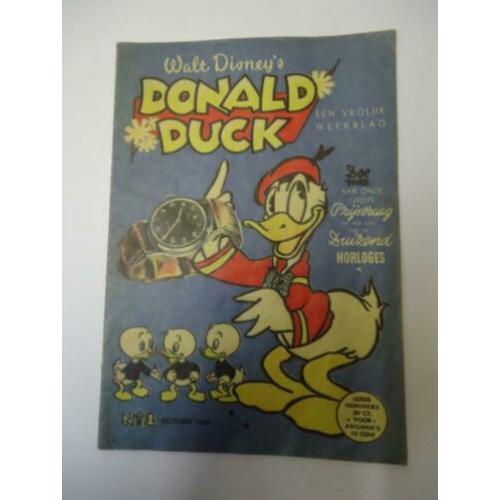 Veel Donald Duck strips/albums en boeken, enkele in seal.