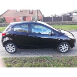 Mazda 2 1.3 TS 5DRS 2011 Bruin, lederen stoelen