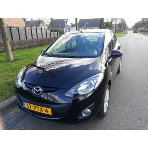 Mazda 2 1.3 TS 5DRS 2011 Bruin, lederen stoelen