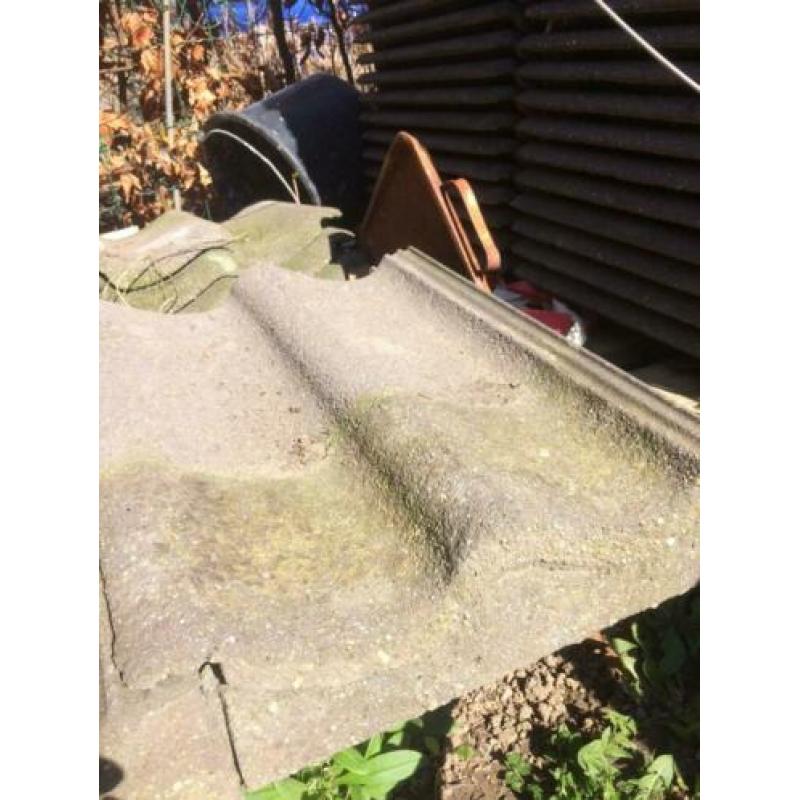Betonnen nokvorsten en zijpannen