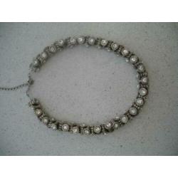 Zilverkleurige Tonnetjes Kralen Ketting met Strass ??