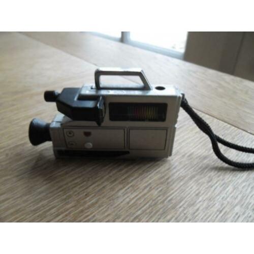 Aansteker. Filmcamera.