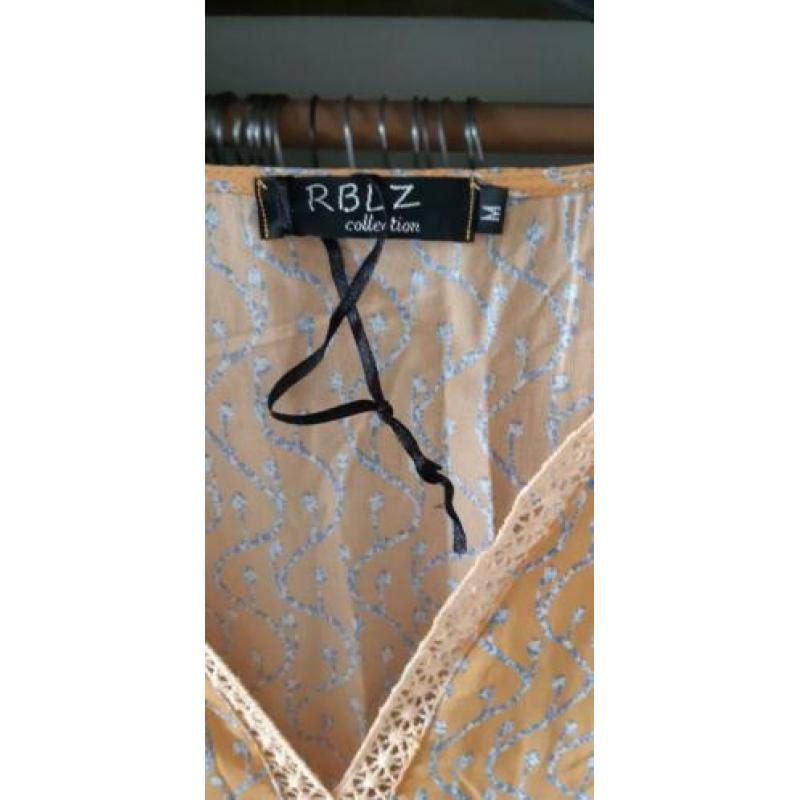Leuk zomer jurkje maat M, en pantervest maat XL