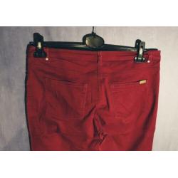 H&M broek 7/8 Rood met ritsjes in de pijpen.