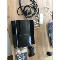 Playstation 3 in goede staat,kabels, controller, 2spellen