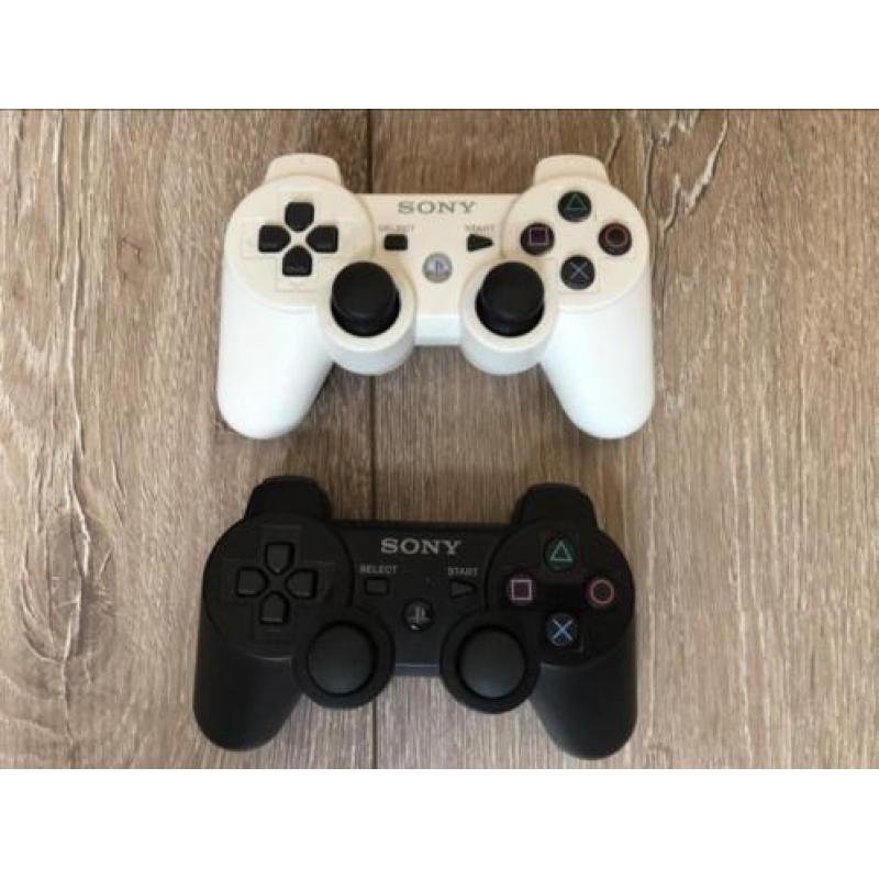 Playstation 3 + 43 spellen + 2 controllers